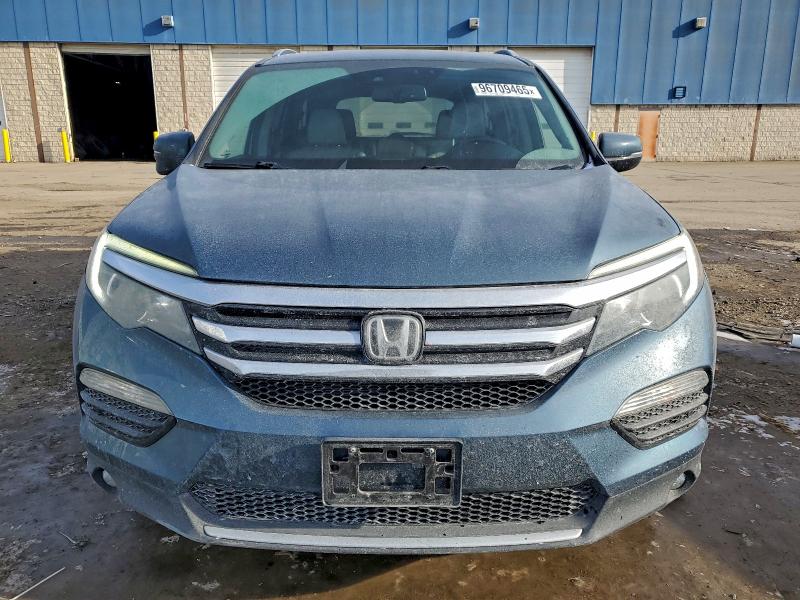 Photo 5 from auction – 2017 HONDA PILOT TOUR with VIN 5FNYF6H9XHB092108