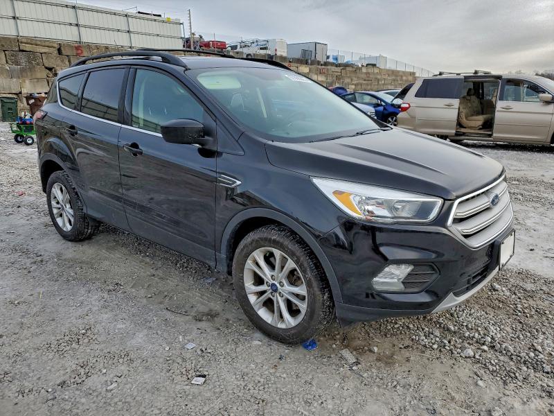 Photo 4 from auction – 2018 FORD ESCAPE SE with VIN 1FMCU9GD3JUB29239