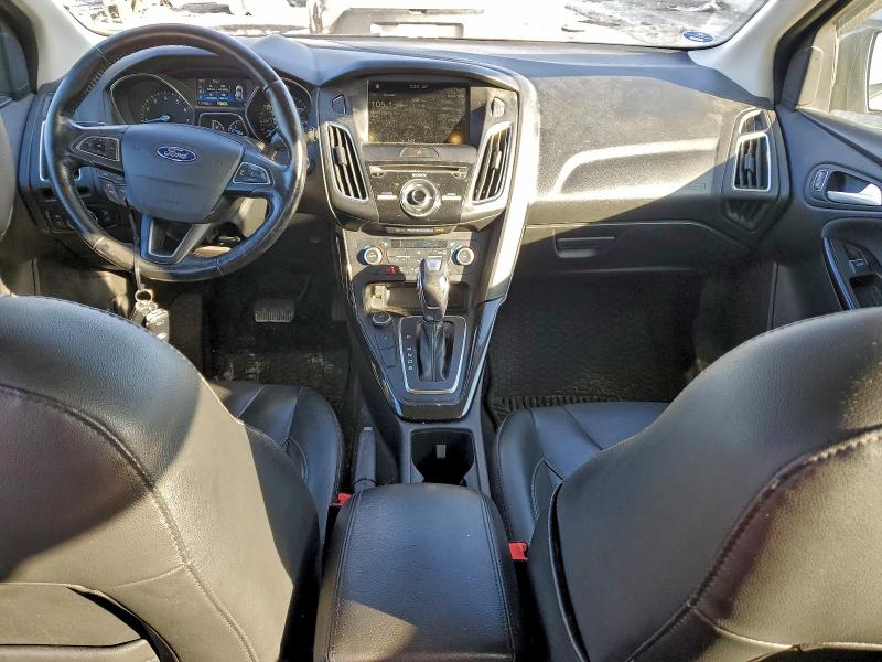 Photo 8 from auction – 2017 FORD FOCUS TITA with VIN 1FADP3N22HL342591
