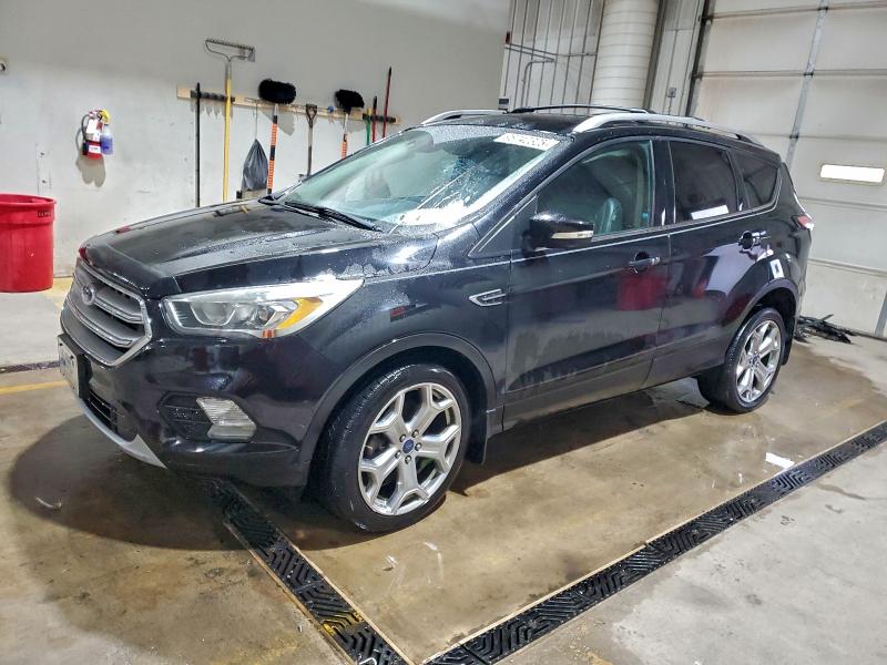 FORD ESCAPE TIT 2017 with VIN 1FMCU9J94HUD03432 - Photo from auction