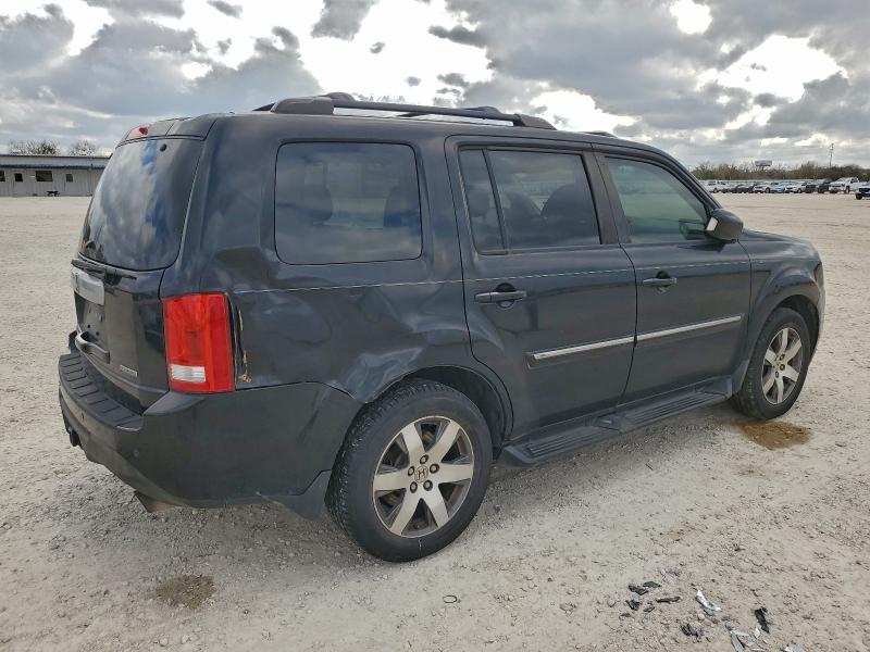 Photo 3 from auction – 2014 HONDA PILOT TOUR with VIN 5FNYF3H96EB001572