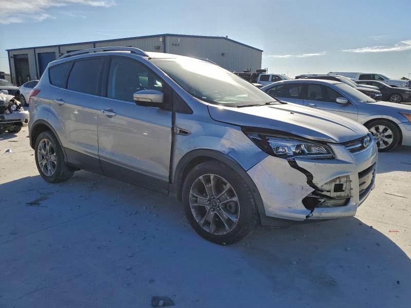 Photo 4 from auction – 2014 FORD ESCAPE TIT with VIN 1FMCU9JX2EUA33658