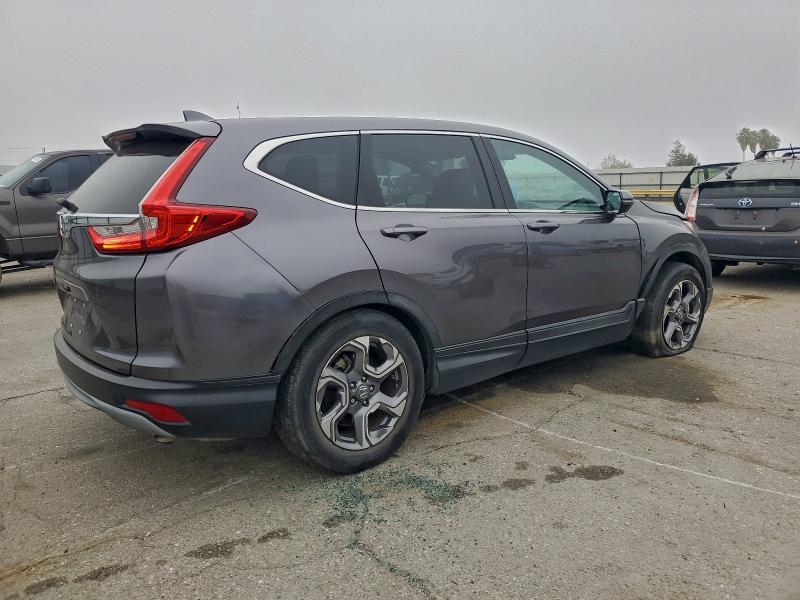 Photo 3 from auction – 2017 HONDA CR-V EXL with VIN 7FARW1H85HE021112