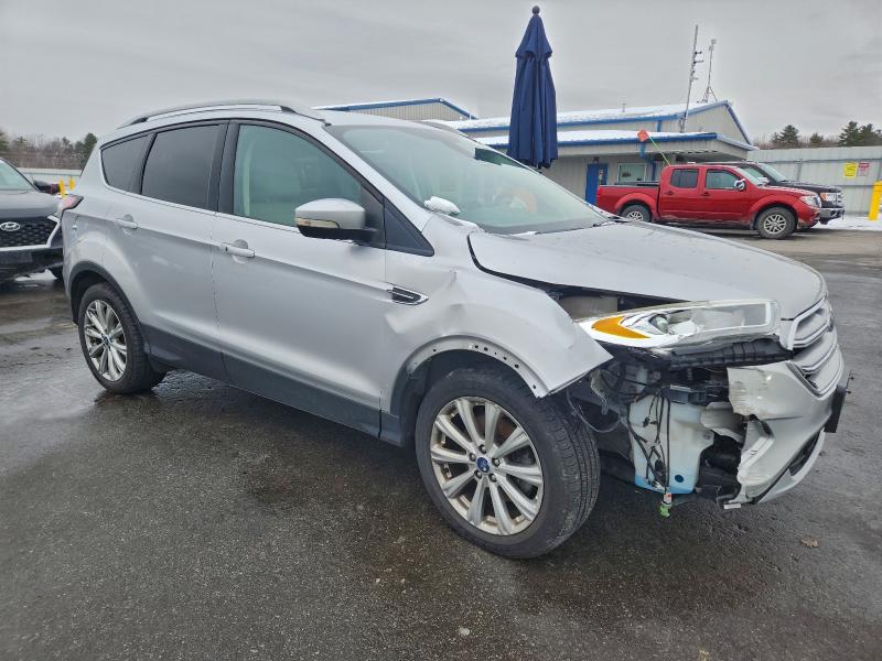 Photo 4 from auction – 2017 FORD ESCAPE TIT with VIN 1FMCU9J92HUC56336