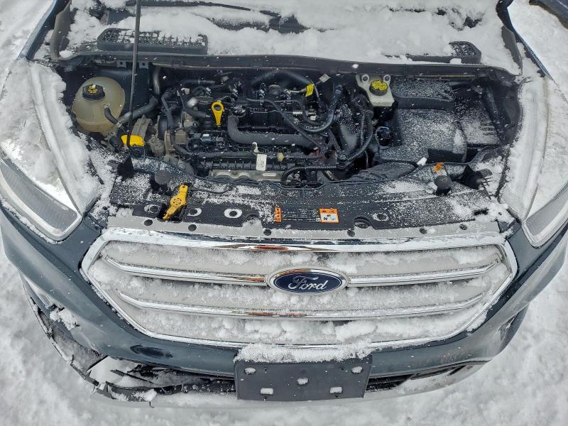Photo 12 from auction – 2019 FORD ESCAPE with VIN 1FMCU9GD4KUB09521