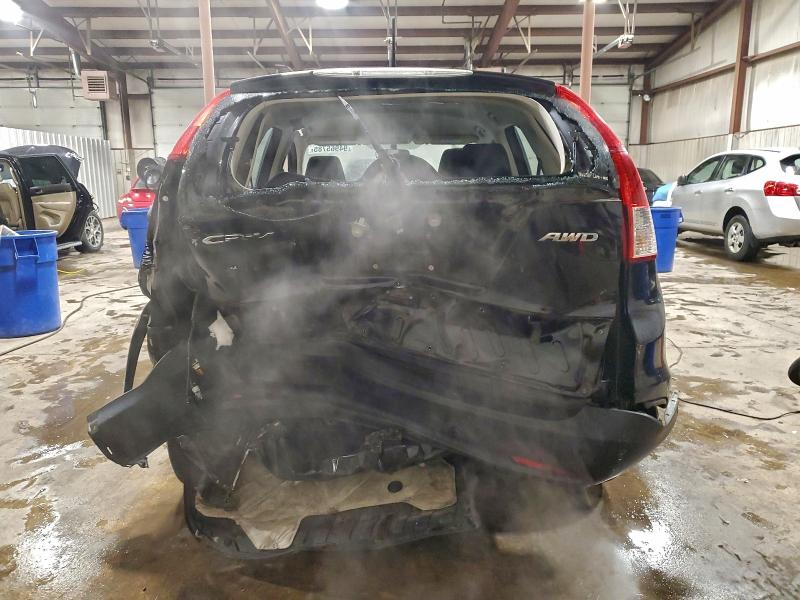 Photo 6 from auction – 2013 HONDA CR-V LX with VIN 2HKRM4H33DH662990