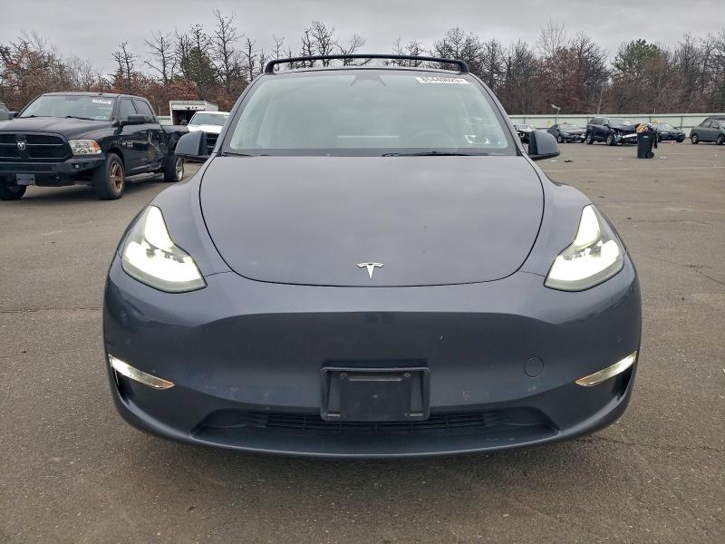 Photo 5 from auction – 2022 TESLA MODEL Y with VIN 7SAYGDEF8NF543160