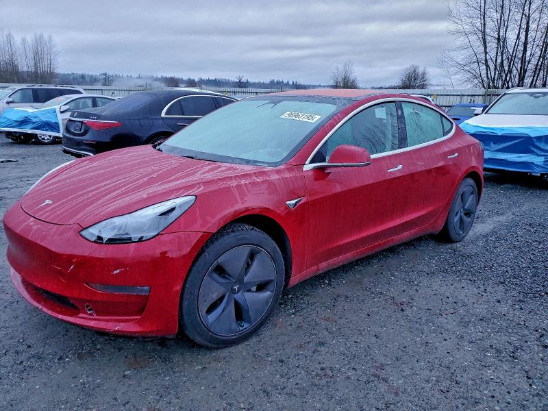 TESLA MODEL 3 2018 with VIN 5YJ3E1EA9JF048041 - Photo from auction