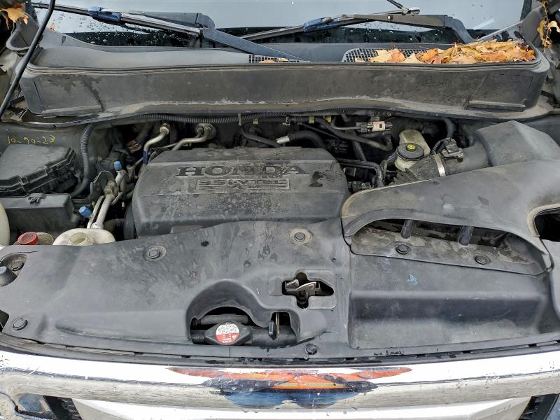 Photo 12 from auction – 2011 HONDA PILOT EXL with VIN 5FNYF4H65BB040693