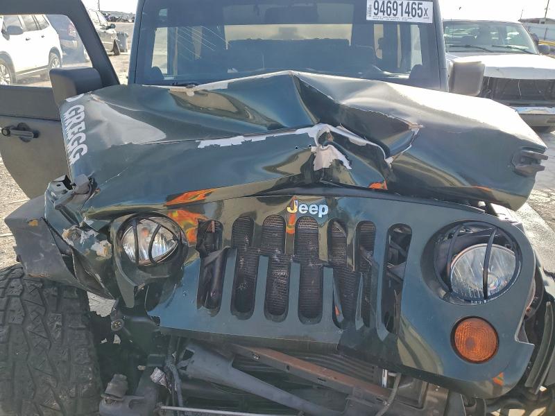 Photo 11 from auction – 2011 JEEP WRANGLER S with VIN 1J4AA2D1XBL595726