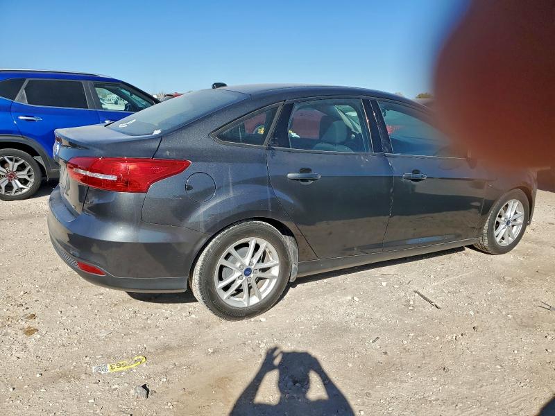 Photo 3 from auction – 2016 FORD FOCUS SE with VIN 1FADP3F23GL404562