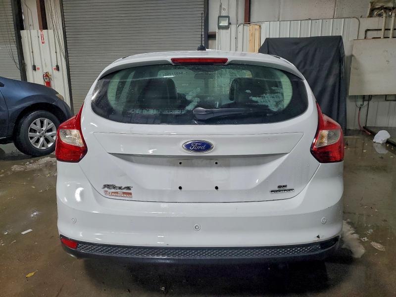 Photo 6 from auction – 2014 FORD FOCUS with VIN 1FADP3K25EL181461