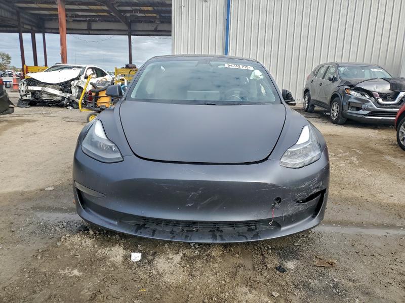 Photo 5 from auction – 2021 TESLA MODEL 3 with VIN 5YJ3E1EC3MF981150