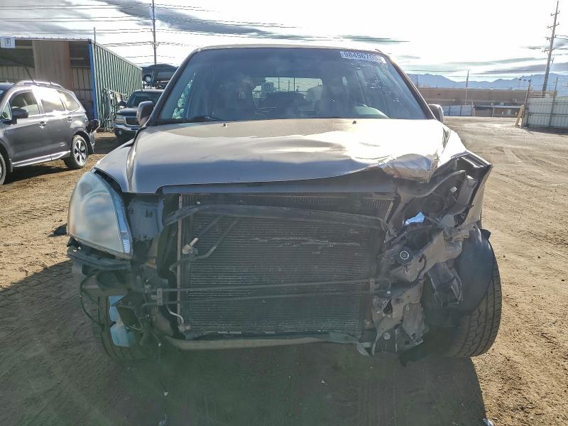 Photo 5 from auction – 2004 HONDA PILOT EXL with VIN 2HKYF18514H542725