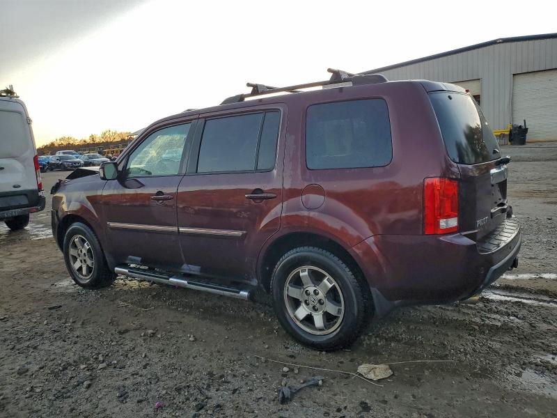 Photo 2 from auction – 2011 HONDA PILOT TOUR with VIN 5FNYF3H92BB030188