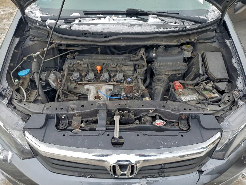 Photo 11 from auction – 2012 HONDA CIVIC LX with VIN 2HGFB2F55CH575313