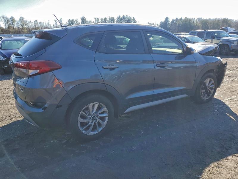 Photo 3 from auction – 2017 HYUNDAI TUCSON with VIN KM8J3CA21HU436062