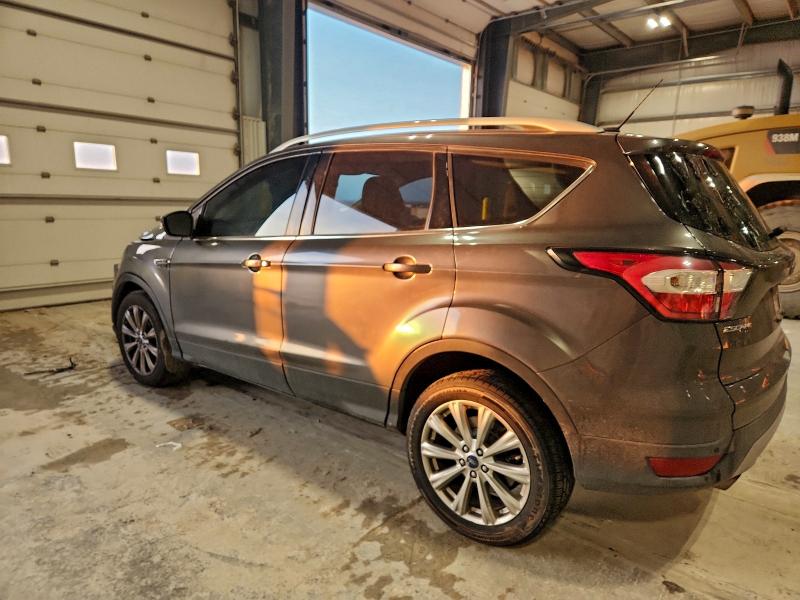 Photo 2 from auction – 2017 FORD ESCAPE TIT with VIN 1FMCU9JD1HUB74540