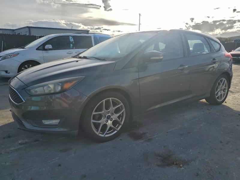 FORD FOCUS SE 2015 with VIN 1FADP3K21FL264127 - Photo from auction