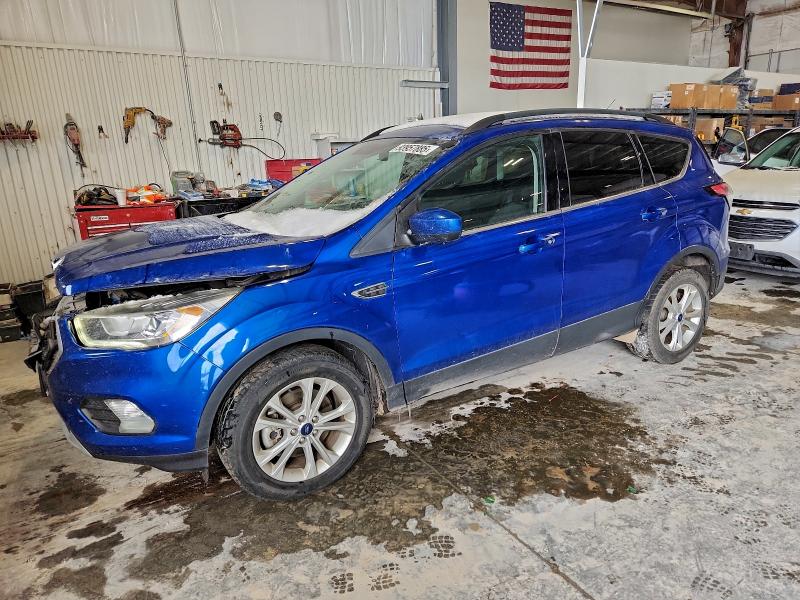 FORD ESCAPE 2018 with VIN 1FMCU9HD7JUB86705 - Photo from auction