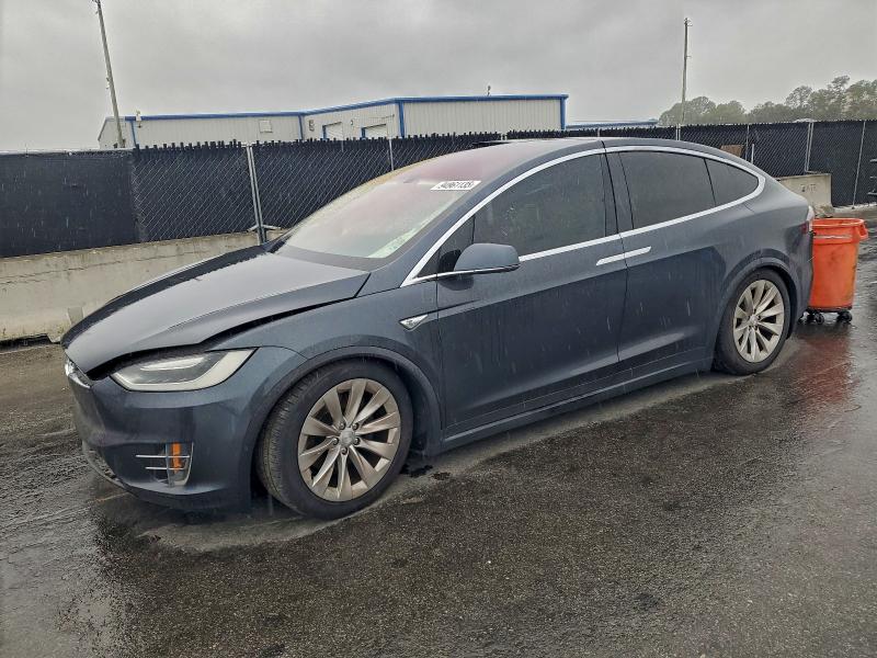 TESLA MODEL X 2016 with VIN 5YJXCBE26GF016386 - Photo from auction