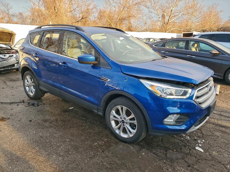 Photo 4 from auction – 2017 FORD ESCAPE SE with VIN 1FMCU0GD9HUC40223