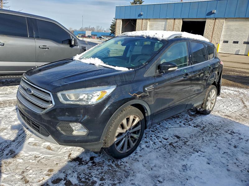 FORD ESCAPE TIT 2017 with VIN 1FMCU9J92HUC99171 - Photo from auction
