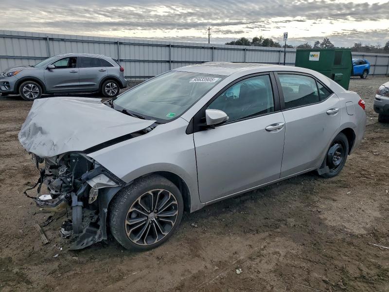 TOYOTA COROLLA L 2015 with VIN 2T1BURHE4FC332667 - Photo from auction