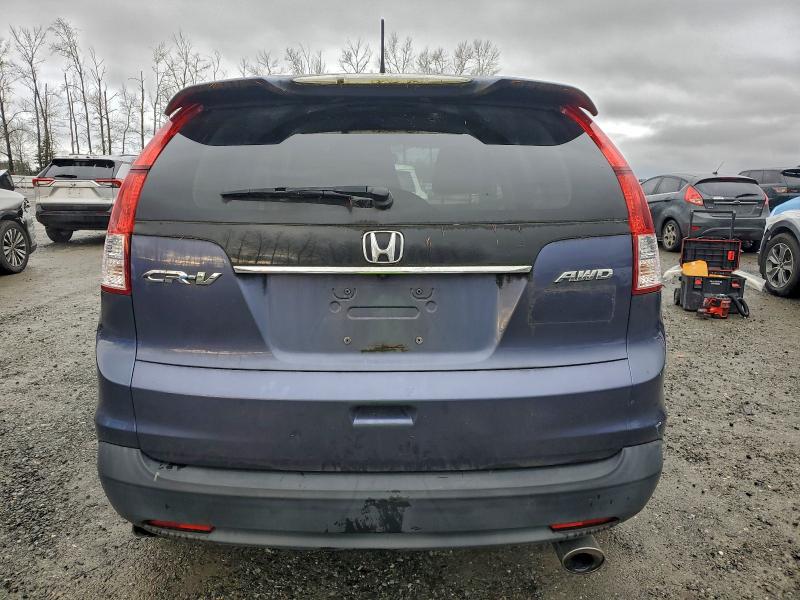 Photo 6 from auction – 2012 HONDA CR-V EX with VIN JHLRM4H57CC017483