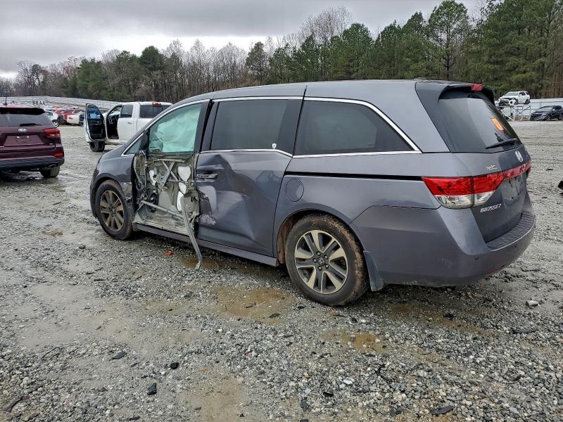 Photo 2 from auction – 2016 HONDA ODYSSEY with VIN 5FNRL5H92GB058492