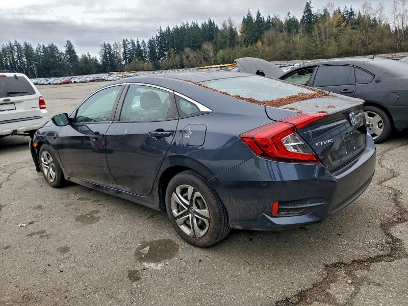 Photo 2 from auction – 2018 HONDA CIVIC LX with VIN 2HGFC2F52JH593309