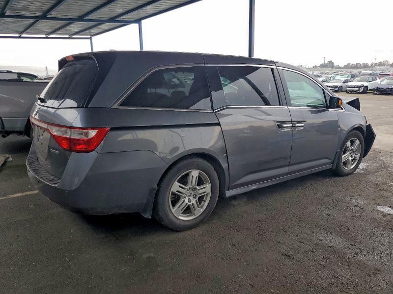 Photo 3 from auction – 2012 HONDA ODYSSEY TO with VIN 5FNRL5H98CB068826