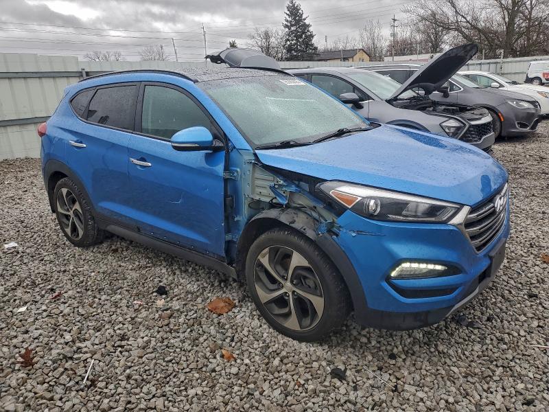 Photo 4 from auction – 2016 HYUNDAI TUCSON LIM with VIN KM8J33A25GU159771