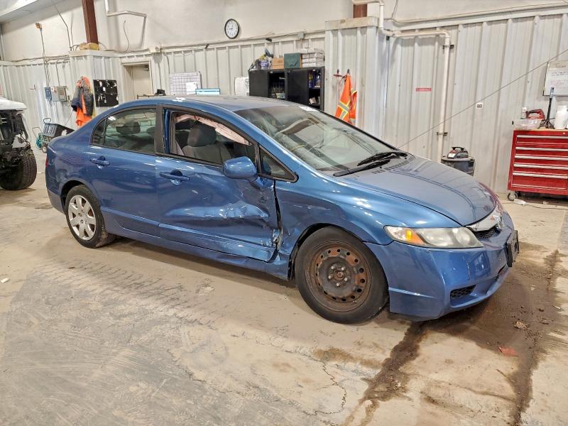 Photo 4 from auction – 2011 HONDA CIVIC LX with VIN 19XFA1F5XBE014434