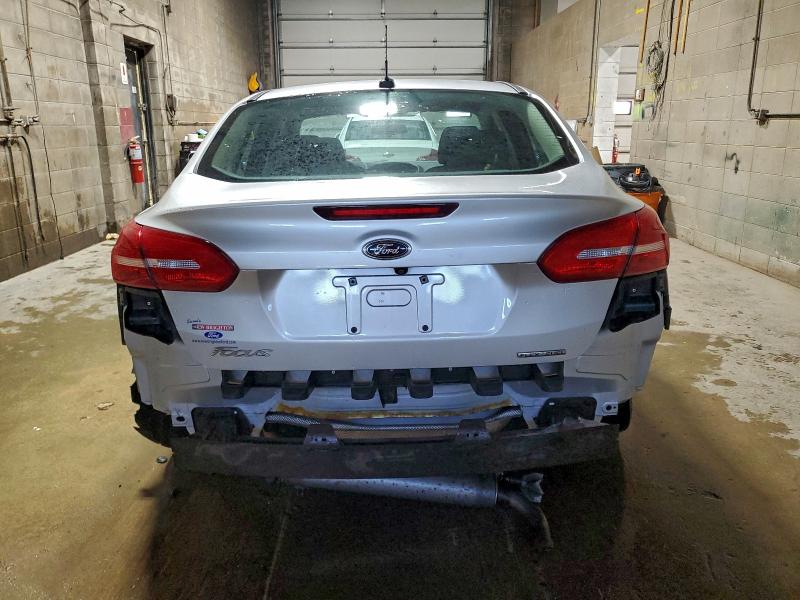 Photo 6 from auction – 2015 FORD FOCUS S with VIN 1FADP3E24FL308357