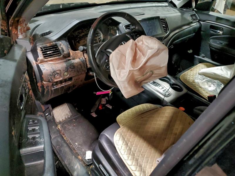 Photo 8 from auction – 2023 HONDA RIDGELINE with VIN 5FPYK3F76PB038970