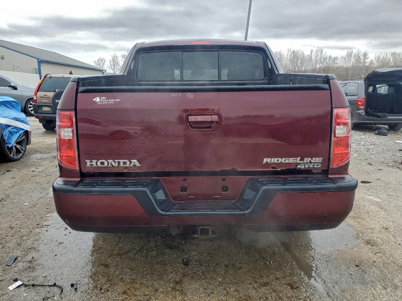 Photo 6 from auction – 2010 HONDA RIDGELINE with VIN 5FPYK1F58AB011523