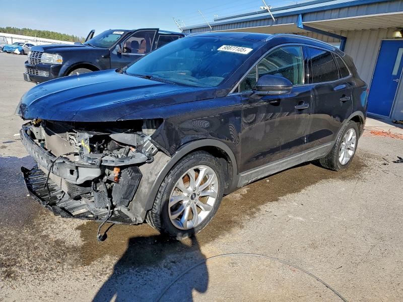 LINCOLN MKC 2015 with VIN 5LMCJ1A9XFUJ08987 - Photo from auction