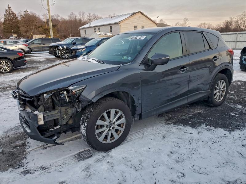 MAZDA CX-5 TOURI 2016 with VIN JM3KE4CY5G0873036 - Photo from auction