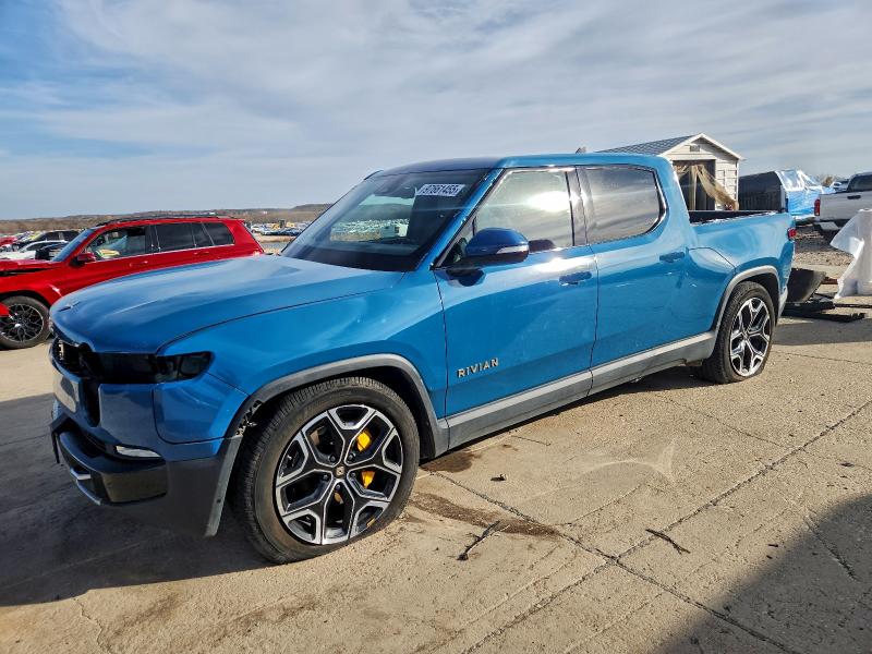 RIVIAN R1T ADVENT 2022 with VIN 7FCTGAAA9NN011962 - Photo from auction