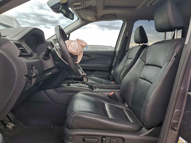 Photo 7 from auction – 2018 HONDA PILOT TOUR with VIN 5FNYF6H98JB029272