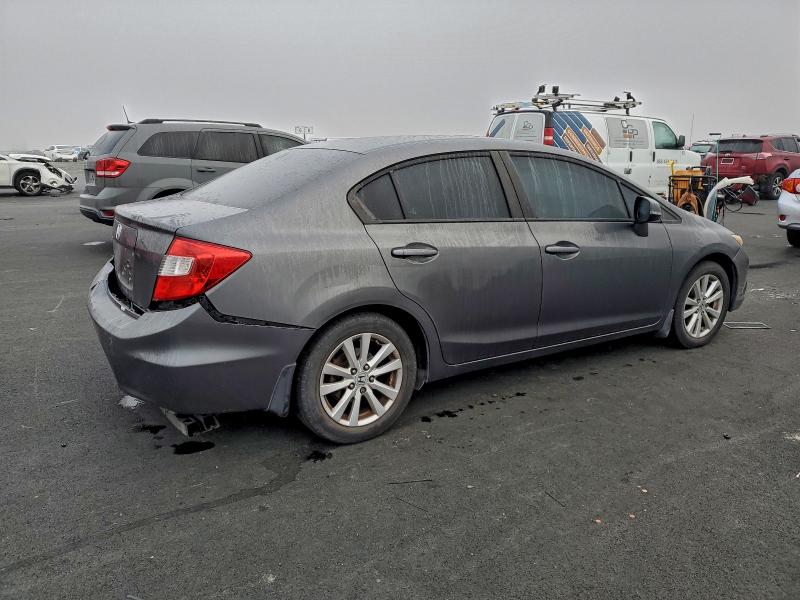 Photo 3 from auction – 2012 HONDA CIVIC EXL with VIN 2HGFB2F94CH578514