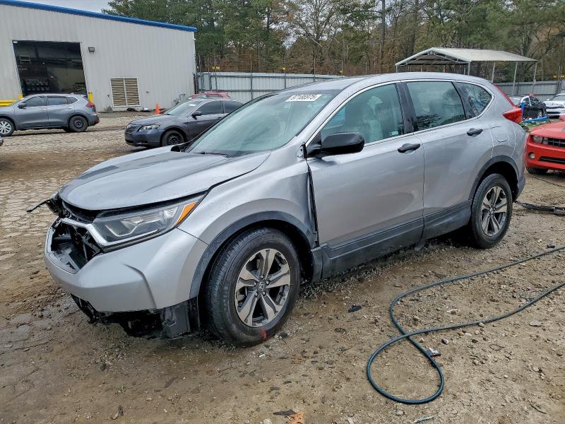 HONDA CR-V LX 2019 with VIN 2HKRW5H35KH414995 - Photo from auction