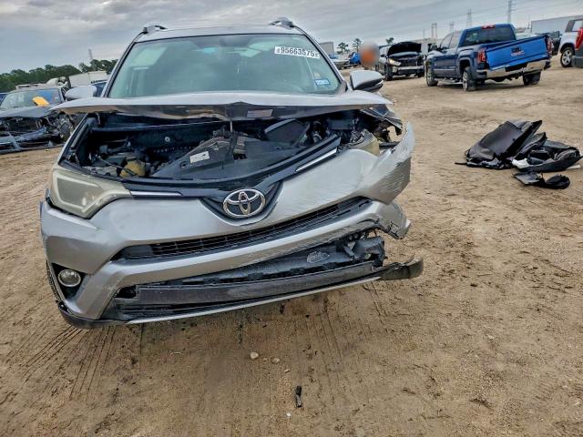 Photo 5 from auction – 2016 TOYOTA RAV4 with VIN 2T3WFREV2GW296873