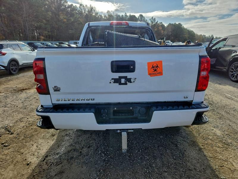 Photo 6 from auction – 2018 CHEVROLET SILVERADO with VIN 3GCUKREC6JG612901