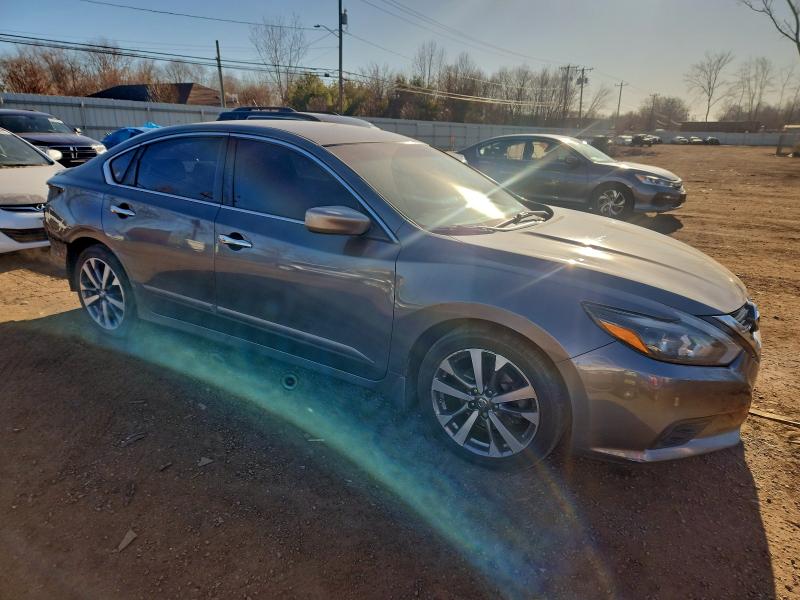 Photo 4 from auction – 2017 NISSAN ALTIMA 2.5 with VIN 1N4AL3AP7HC141060