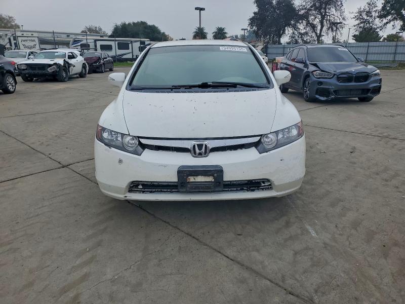 Photo 5 from auction – 2007 HONDA CIVIC HYBR with VIN JHMFA362X7S030718