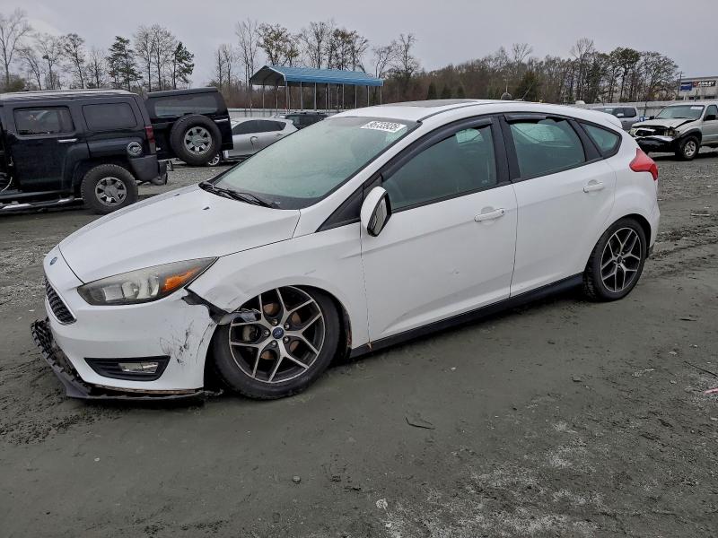 FORD FOCUS SEL 2017 with VIN 1FADP3M2XHL337172 - Photo from auction