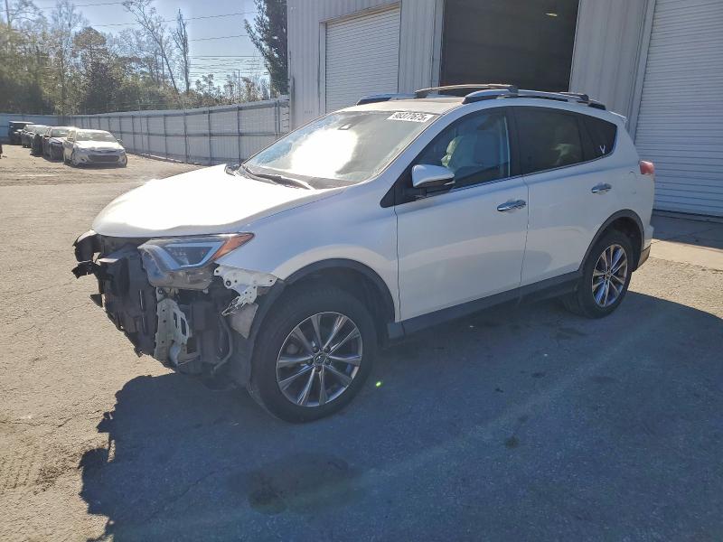 TOYOTA RAV4 LIMIT 2016 with VIN 2T3YFREV2GW292797 - Photo from auction