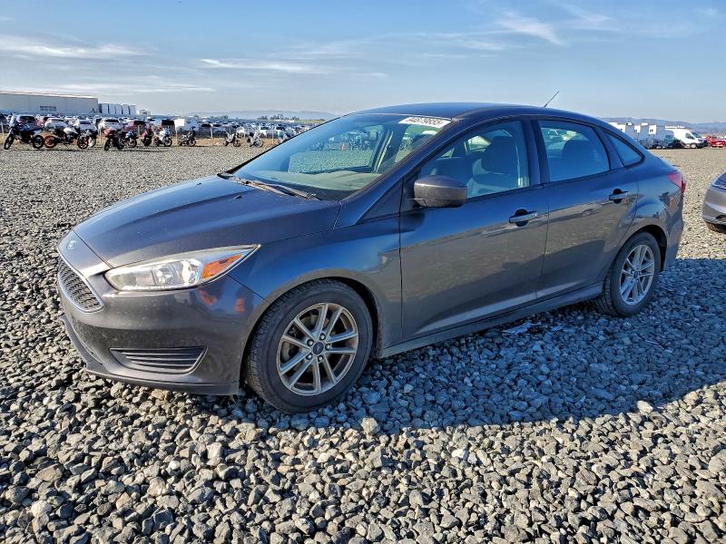 FORD FOCUS SE 2018 with VIN 1FADP3F23JL212954 - Photo from auction